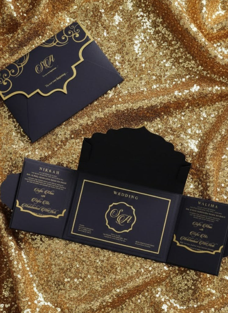 purple wedding invitations with gold details on a glittery gold background