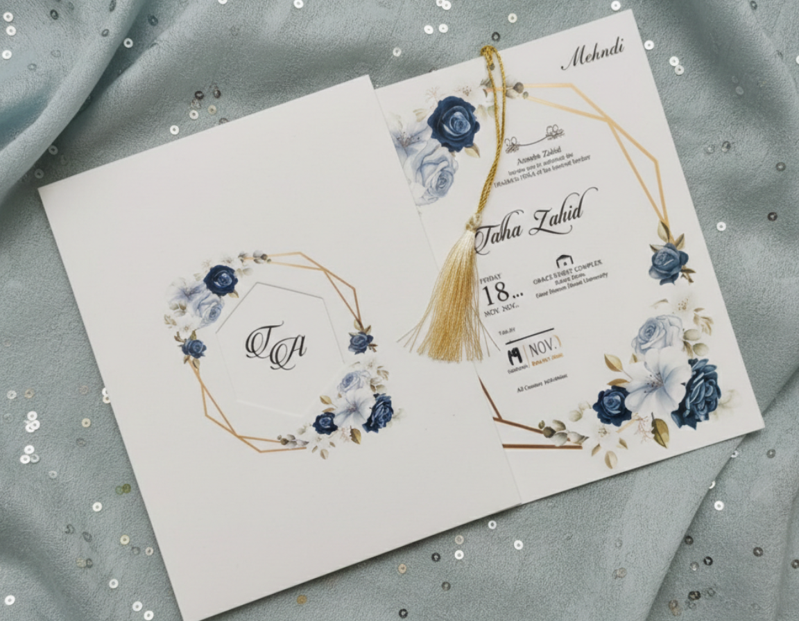 Wedding invitation card with floral design on a textured fabric background