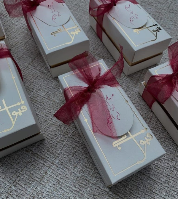 White-and-Gold-Qubool-Hai-Nikkah-Boxes-with-Burgundy-Organza-Ribbons