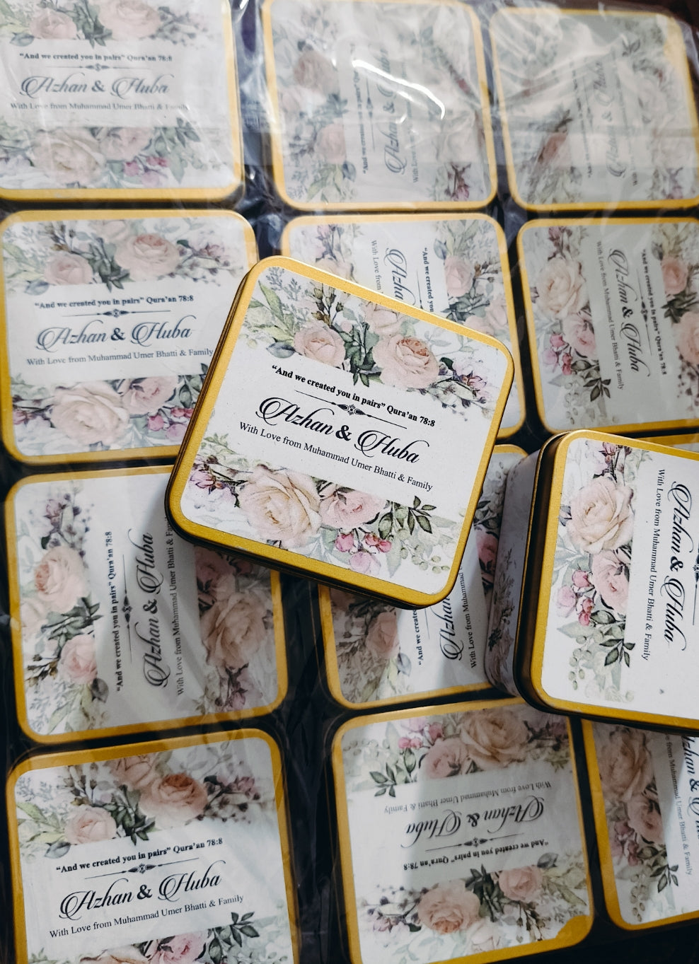 Set of coasters with floral designs and text on a white background