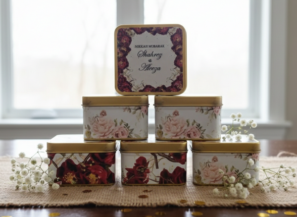 Customized square tin box with floral pattern and customized name printing.